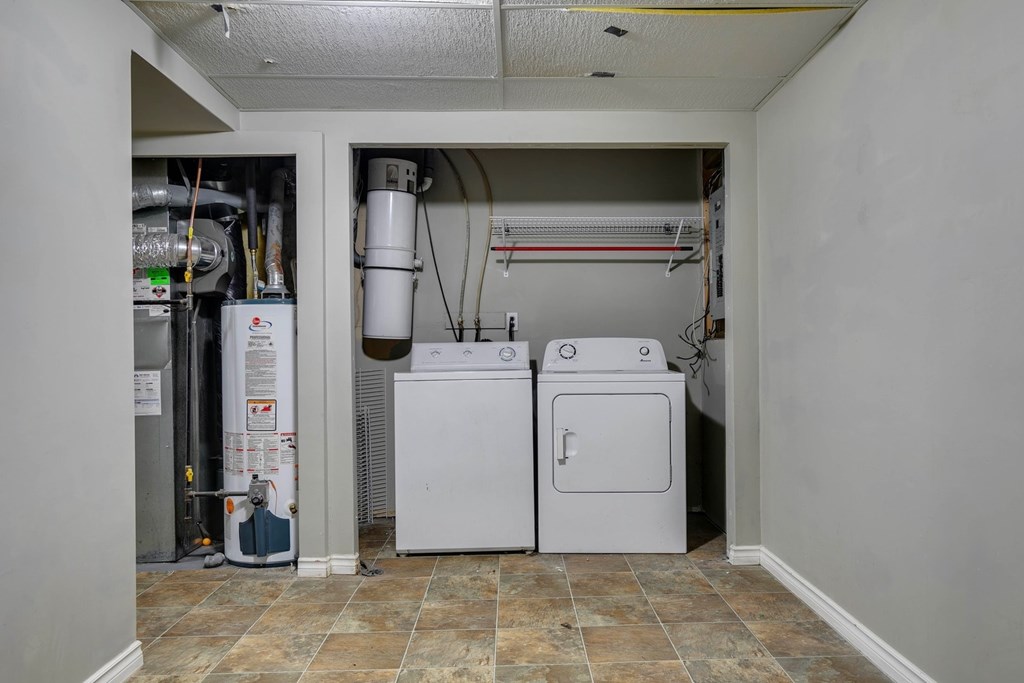 A laundry room with a washer and dryer.
