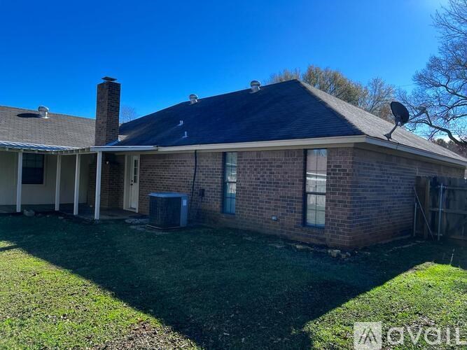 A house with a blue sky in the background.