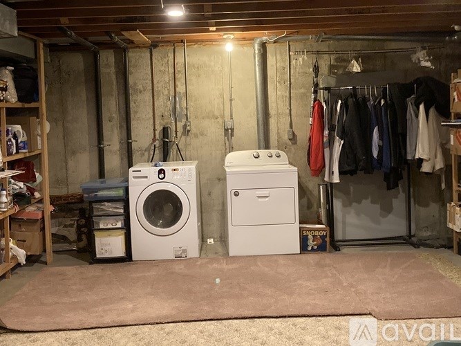 A laundry room with a washer and dryer.