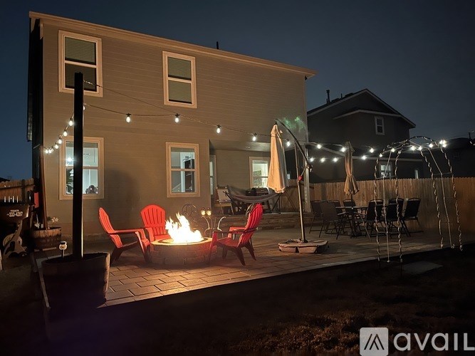 A house with a patio and a fire pit.