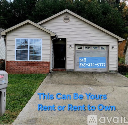 A house with a sign that says "This Can Be Yours Rent or Rent to Own".