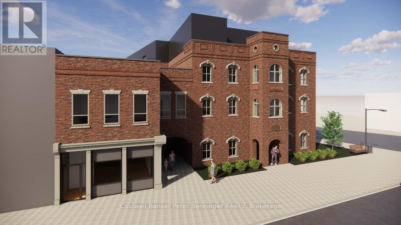 A rendering of a building with a sign that says Coldwell Banker Peter Benninger Realty, Brokerage.