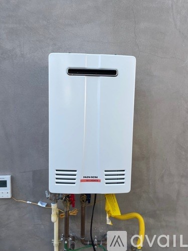 A white box with the word "Havva" on it is mounted on a wall.