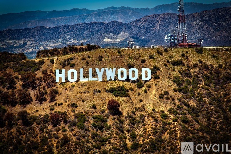 A drilling rig is situated on a hill with the word Hollywood written on it.