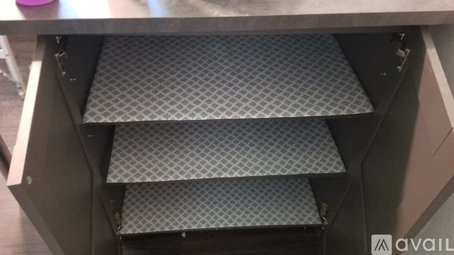 A metal shelf with a diamond pattern is available for purchase.