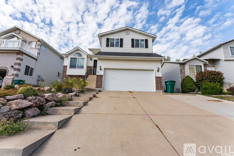 A house with a garage is for sale.