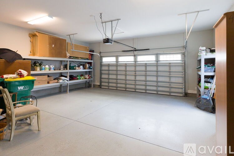 A room with a lot of shelves and storage units.