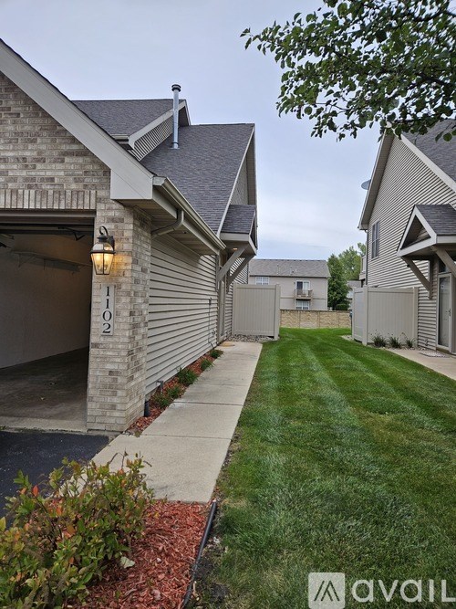 A row of houses with the number 02 on the first one.