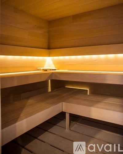 A sauna with wooden benches and walls.