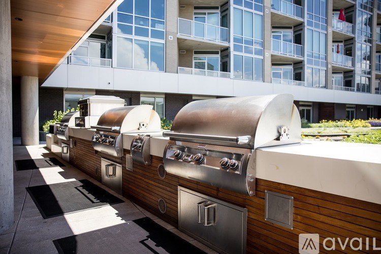 A row of outdoor BBQs are available for rent.