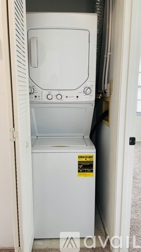 A white dishwasher with the brand name "Mason" on the door.