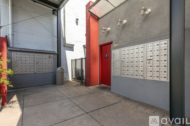 A red door is on the right side of the image.