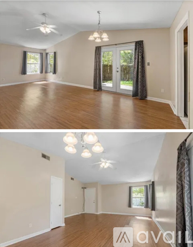 A living room with a ceiling fan and a dining area with a table and chairs.