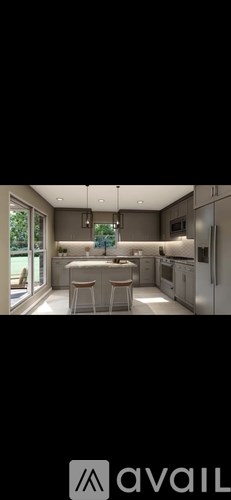 A modern kitchen with a large island in the middle.