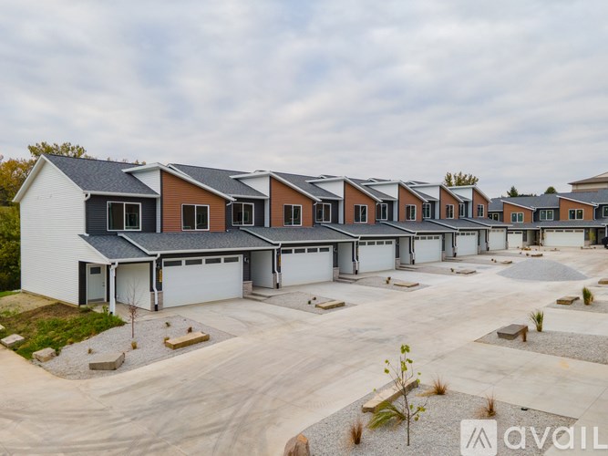 A row of houses with the word "AVAIL" on the bottom right.