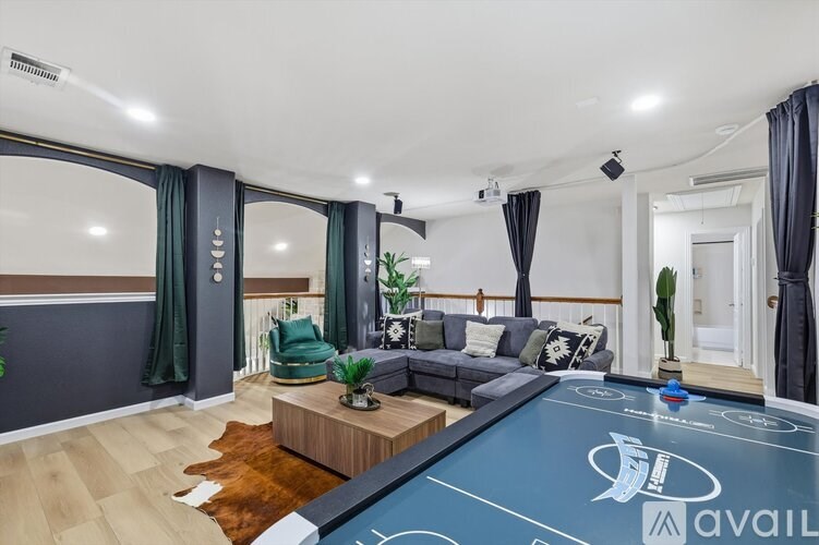 A pool table with the word "available" written on it.