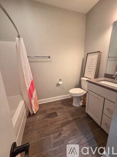 A bird's eye view of a residential area with houses and a church.