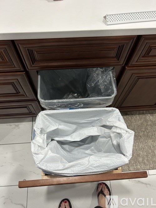 A plastic bag is wrapped around a box.