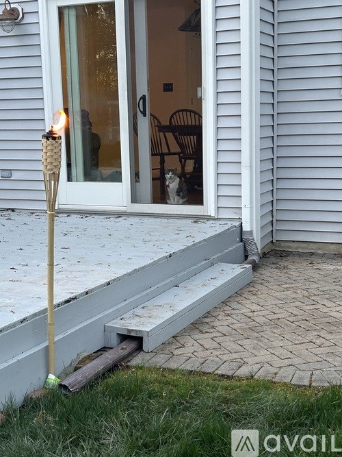 A house with a white door and a glass window.