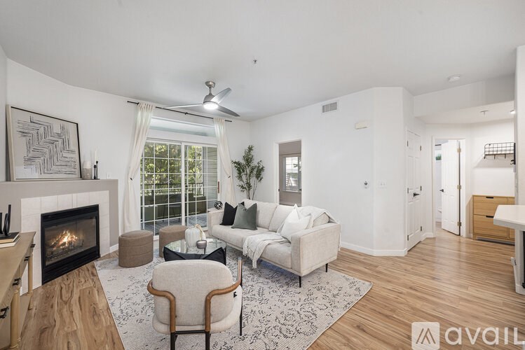 A living room with a fireplace and a couch.