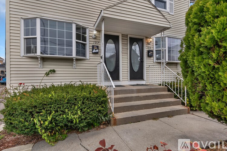 A house with a front yard and a sign that says "available".