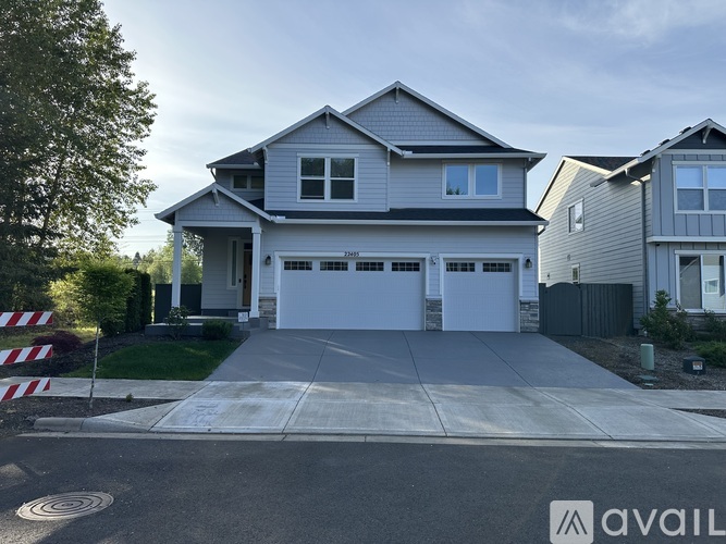 A house with a garage is available for sale.