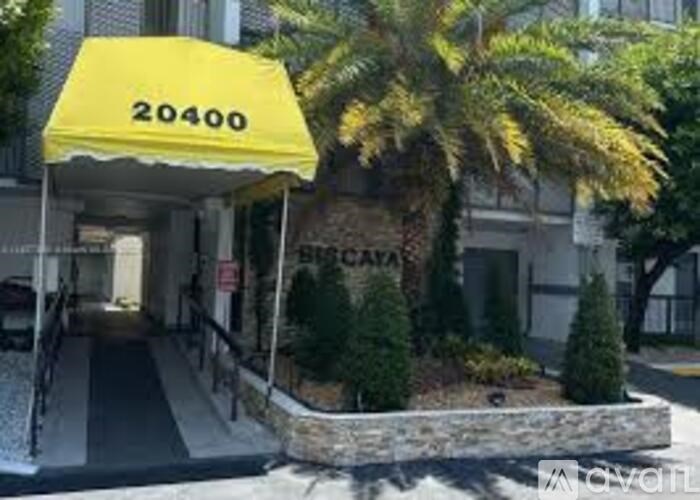 A yellow awning with the number 20400 on it.