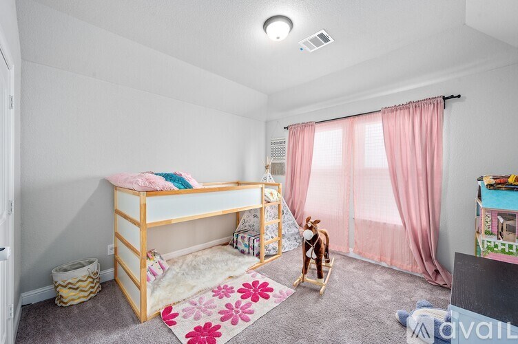 A child's bedroom with a bunk bed and a toy horse.