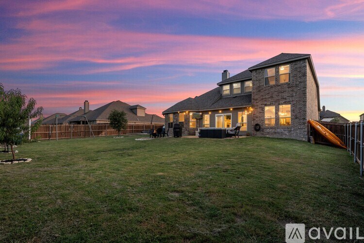 A house with a lawn in front of it is available for sale.