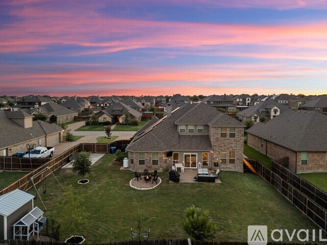 A house with a large backyard is for sale.