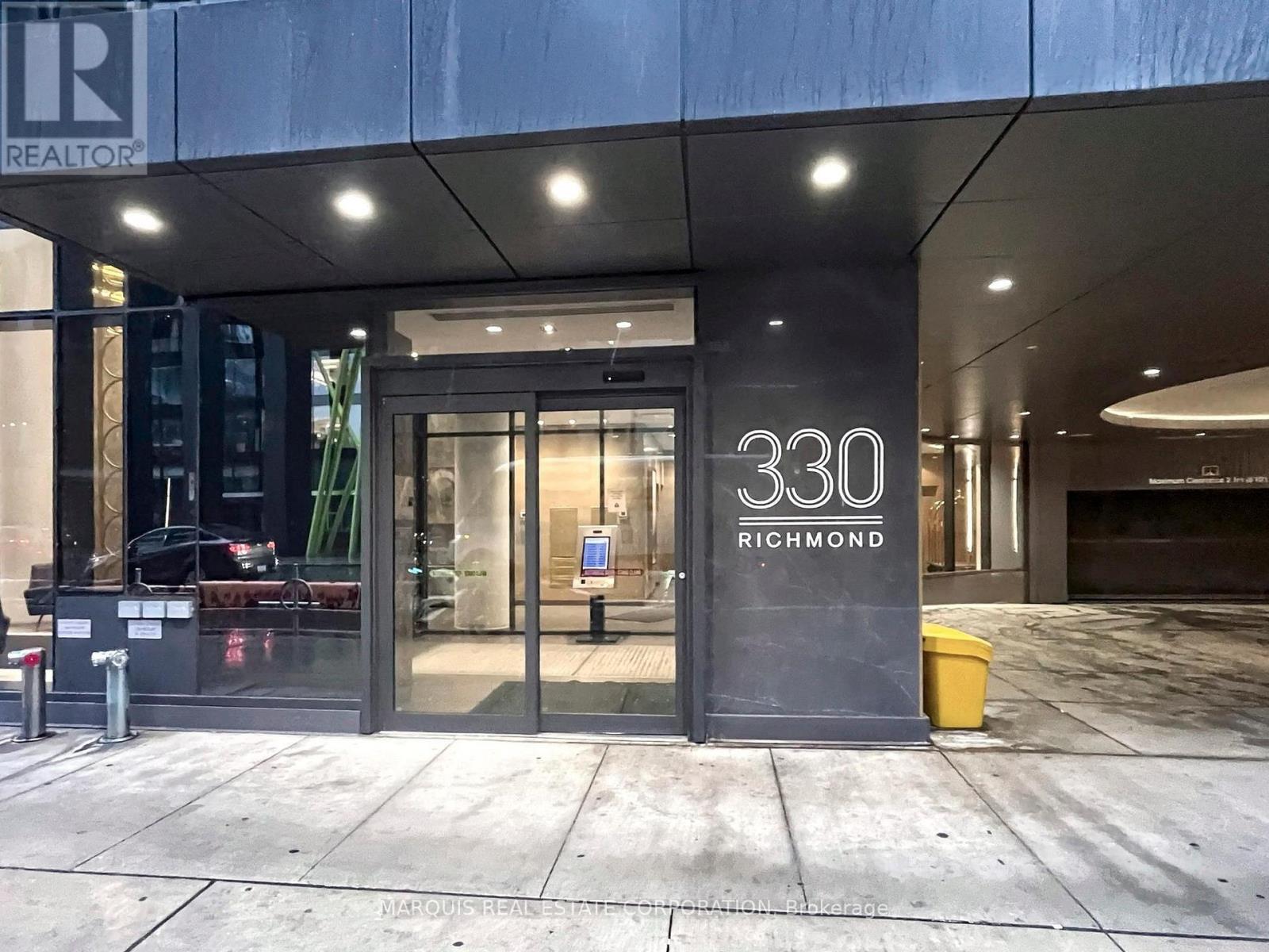 The front of a building with the number 330 on it.