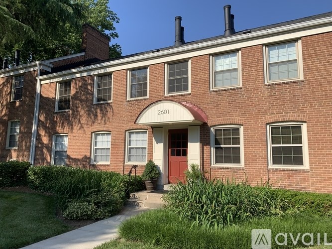 A red brick building with the number 2601 on the front.