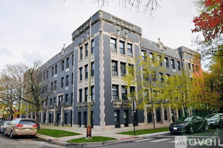 A large, old building with many windows is in the image.