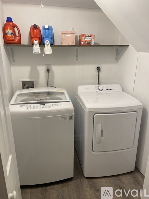 A laundry room with a washer and dryer.