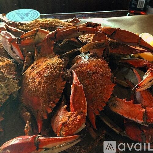 A blue plate with crabs on it.