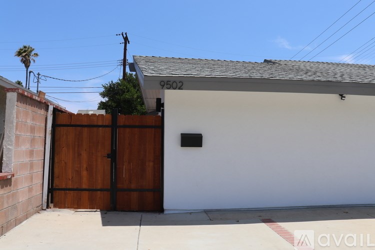 A house with the number 9502 on the garage door.