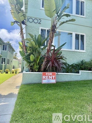 A house numbered 1002 is for rent.