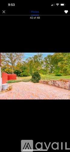 A red fence is visible in the image.