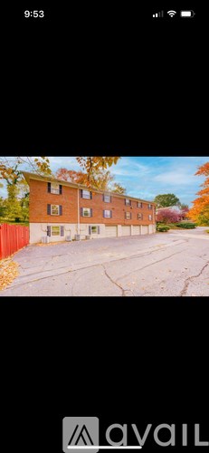 A building with a red fence in front of it.