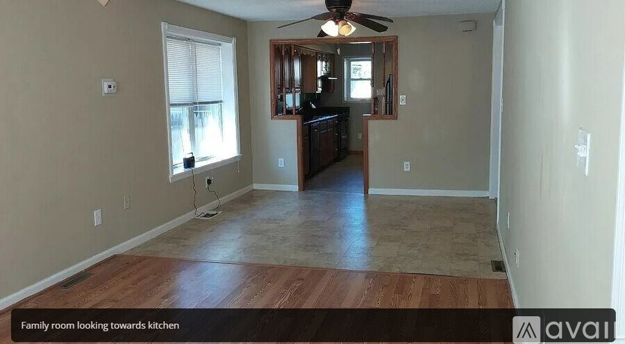 A family room looking towards the kitchen.