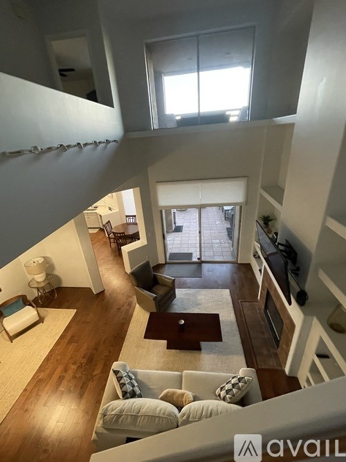 A living room with a couch and a coffee table.