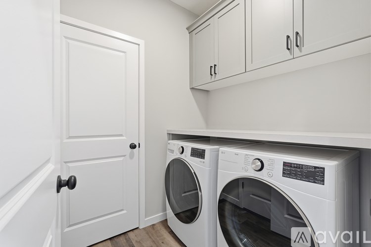 A laundry room with a washer and dryer.
