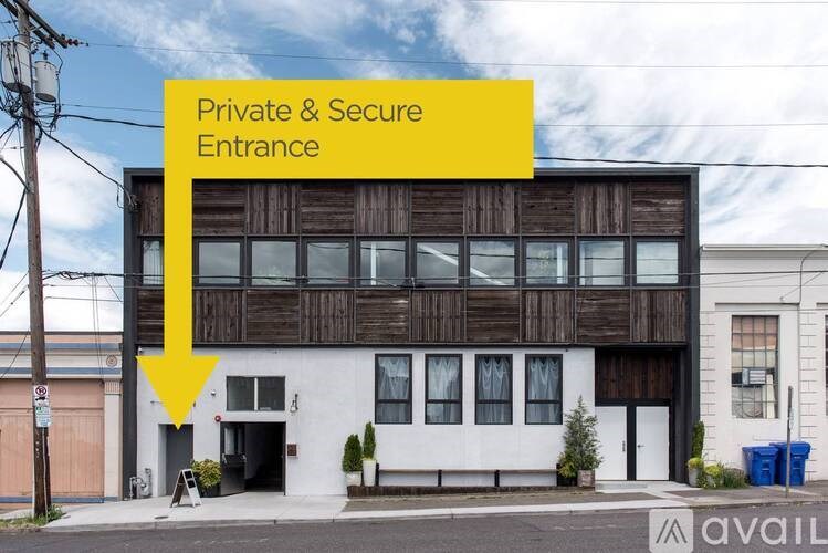 A building with a sign that says Private & Secure Entrance.
