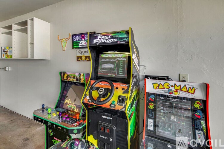 A Pac-Man arcade game is on the right.