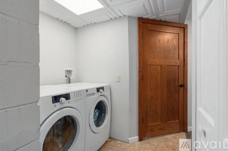 A laundry room with a washer and dryer.