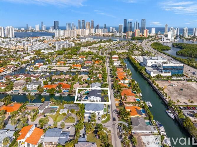 A bird's eye view of a city with a river running through it.