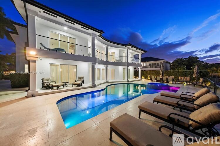 A modern house with a pool in the backyard.