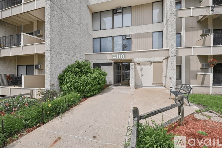 The image shows a building with the number 4100 on it.