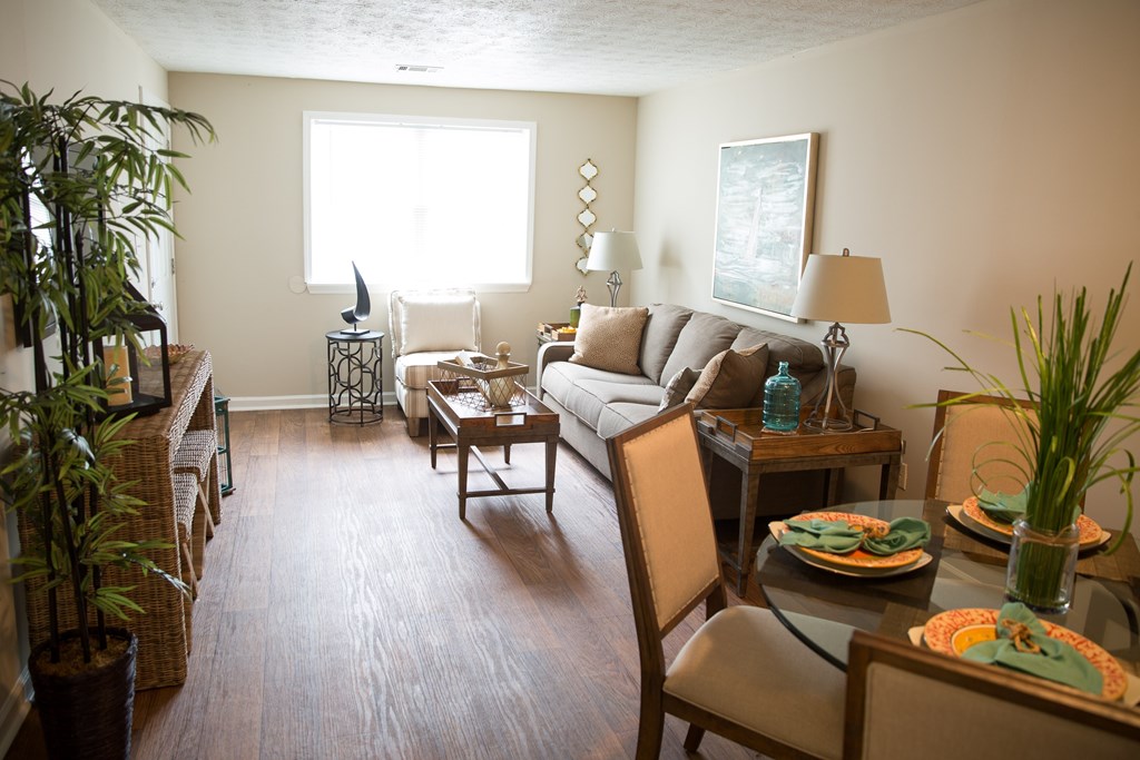 a living room with a couch and a table