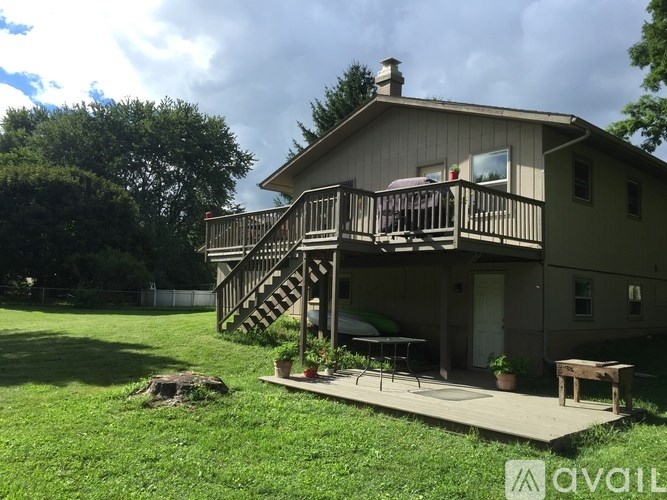 A house with a deck and a patio.
